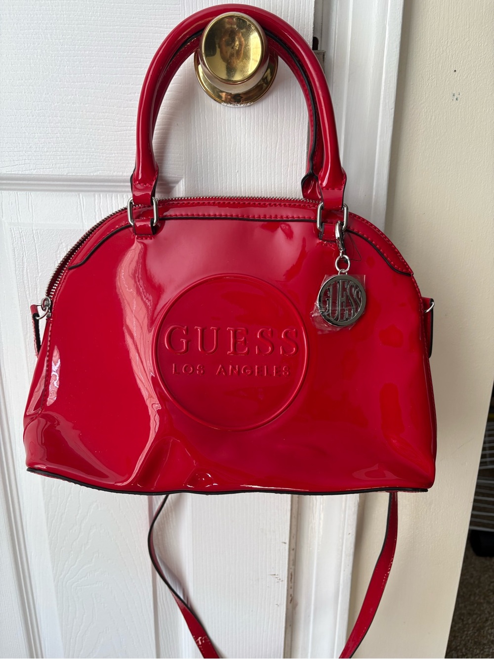 GUESS Shiny Red Patent Dome Satchel with Logo Charm